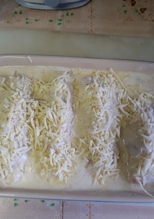 Une photo de Roulades de jambon d'épaule aux chicons (endives) gratinées