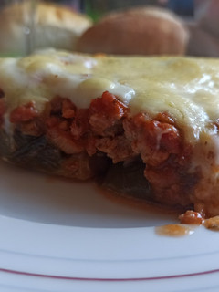 Una foto de Repollitos con bolognesa de cerdo