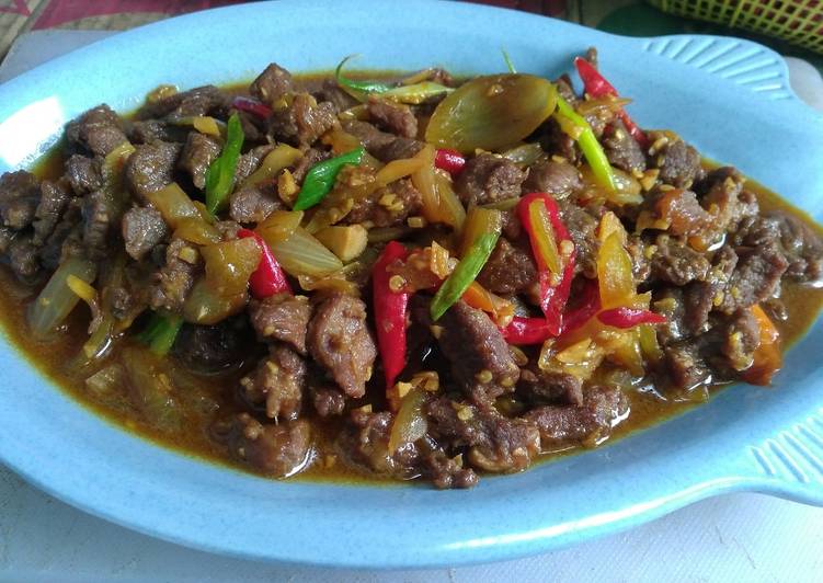 Tumis bombay daging sapi
