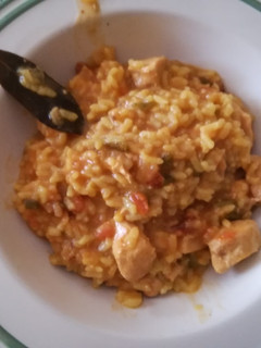 Una foto de Arroz con pollo al aroma de curry