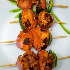 Smoky Flavoured Tandoori Veg Momos A picture of Smoky Flavoured Tandoori Veg Momos.