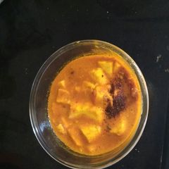 A picture of Tomato paneer.