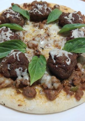 Una foto de Pizza de carne molida