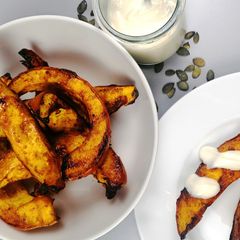 A picture of Honey, orange and whiskey glazed pumpking wedges.