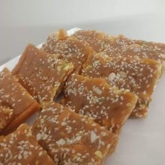 A picture of Gur or dry fruit chiki.