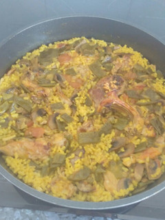 Una foto de Arroz con verduras y conejo al horno