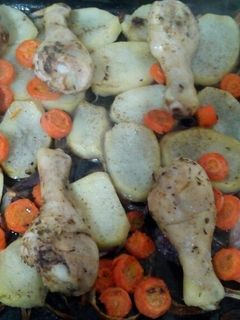 Una foto de Muslitos de pollo al horno
