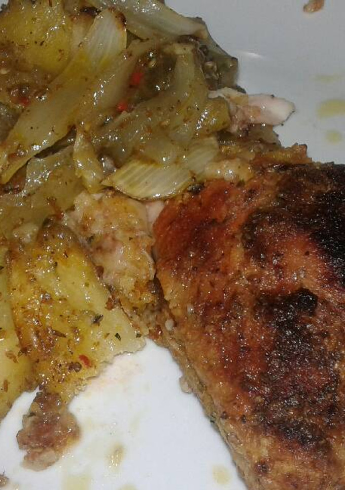Una foto de Pollo al horno con verduras