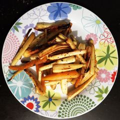 A picture of Oven grilled parsnips.