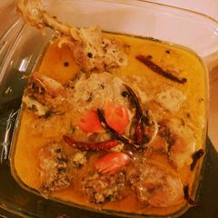 A picture of Chicken rezala.