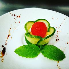 A picture of Watermelon, Cream cheese & Spicy Pineapple with Cured Cucumber.