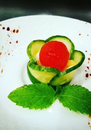 A picture of Watermelon, Cream cheese & Spicy Pineapple with Cured Cucumber.