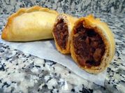 Una foto de chuleta de aguja al horno
