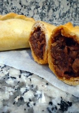 Una foto de Empanadas argentinas de pulled pork BBQ