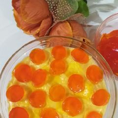 A picture of Custard with orange jelly.