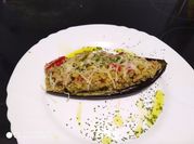 Una foto de morrones rellenos con quinoa
