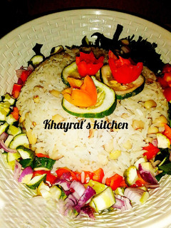 A picture of Rice& beans with dried mix chili pepper.