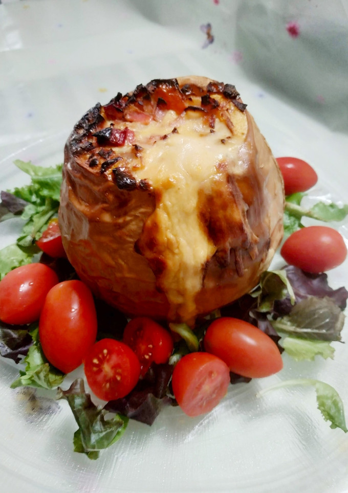 Una foto de Calabaza rellena con queso azul, jamón y nata