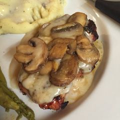 A picture of Grilled Pork Chops With Creamy Mushroom Sauce.