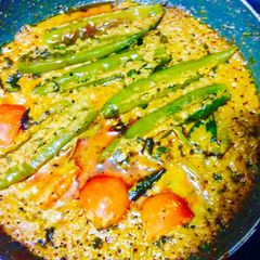 A picture of Hyderabadi paneer stuffed Mirch Ka Salan.