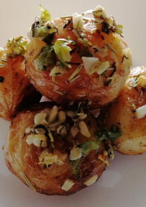 A picture of Buttery garlic and herbs new potatoes.