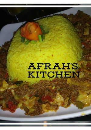 A picture of Cabbage sauce with turmeric rice.