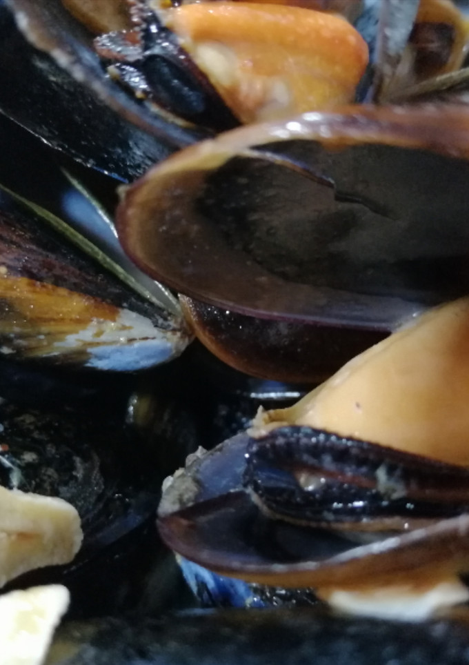 Una foto de Mejillones al ajillo