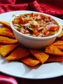 A picture of Nachos & salsa.