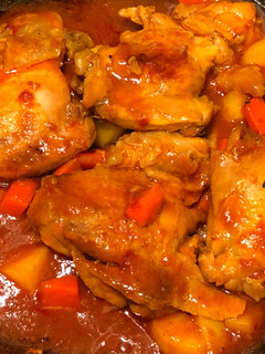 A picture of Chicken Thighs in Red Sauce.