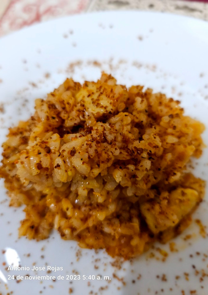 Una foto de Pollo con arroz