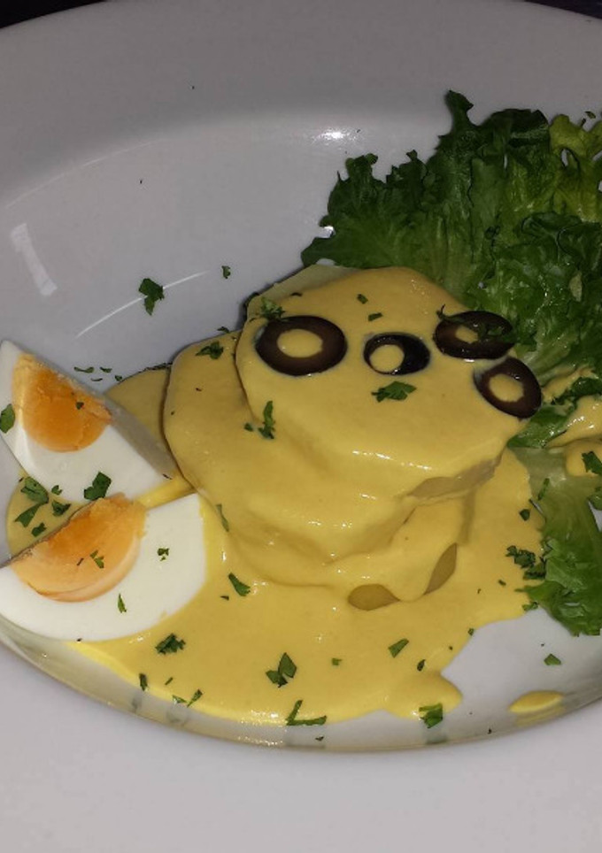 Una foto de Papas a la Huancaína