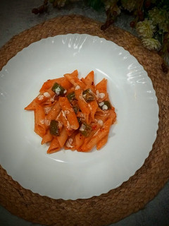 A picture of Red sauce pasta.