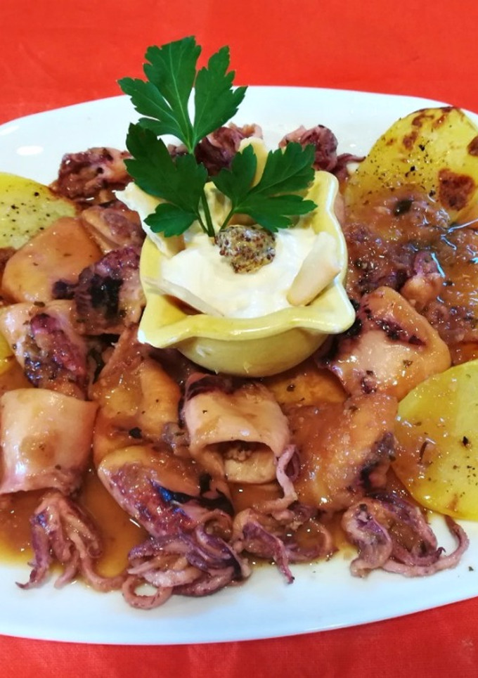 Una foto de Calamares al pil pil