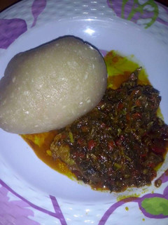 A picture of Eba & veggie soup.
