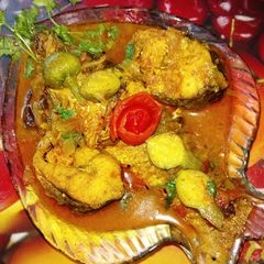 A picture of Bata Fish (Reba Carp) with baby pumpkin in a light gravy.