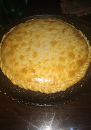 Una foto de Tarta de jamón, queso, tomate y huevo