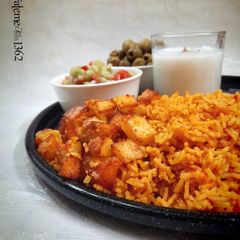 A picture of Persian Tomato Rice (Kateh Gojeh).
