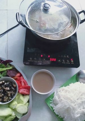 Hình của món Lẩu ốc bươu riêu cua.