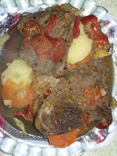Una foto de Bife a la criolla