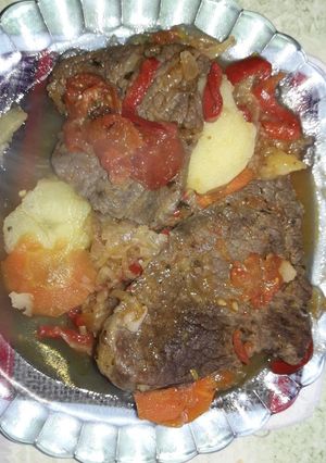 Una foto de Bife a la criolla