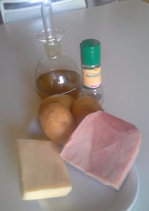 Foto di Patate filante con prosciutto e formaggio