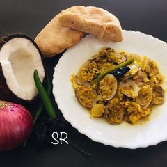 A picture of Tisrya sukhe clams goan style.