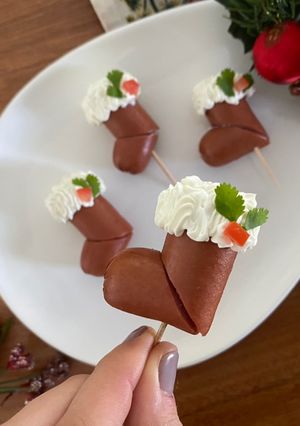 Una foto de Botitas navideñas de salchicha