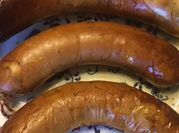 A picture of sausages pepers