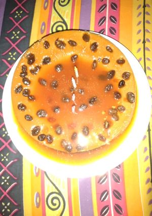 Una foto de Flan de vainilla y pasas