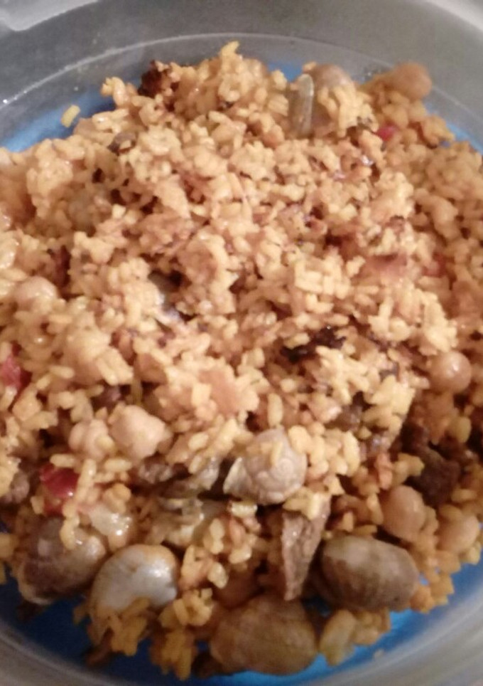 Una foto de Arroz rápido con ternera y caracoles