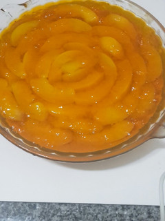 Una foto de Postre de vainillas, flan y gelatina