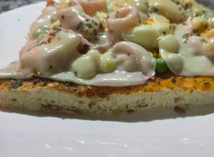 Una foto de Pizza completa (masa en panetera)