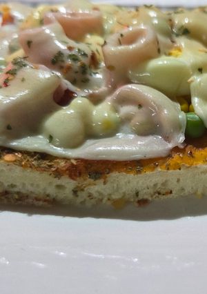 Una foto de Pizza completa (masa en panetera)