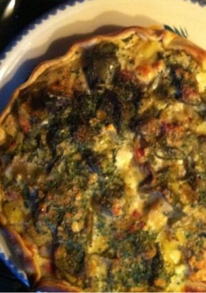 Une photo de Tarte campagnarde aux pommes de terre poireaux lardons oignons et prosciutto